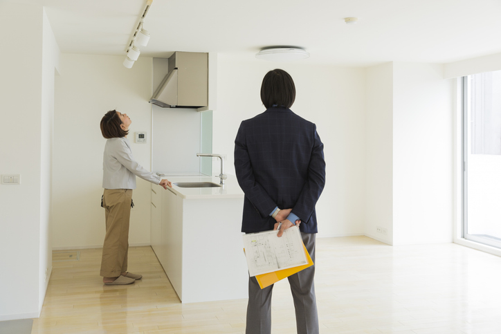 A landlord visiting his rental property to inspect the damages and fix them as soon as possible, as he performs one of the roles in property management.