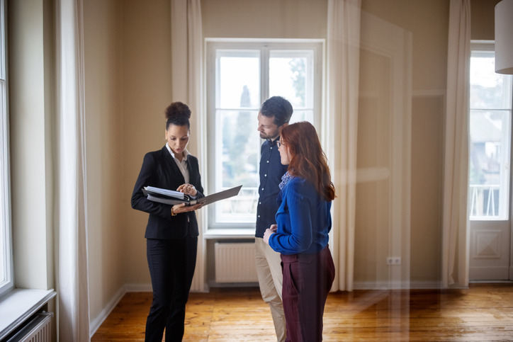 A house rental manager, together with the tenants, explains Alberta rent increase rules for 2025.