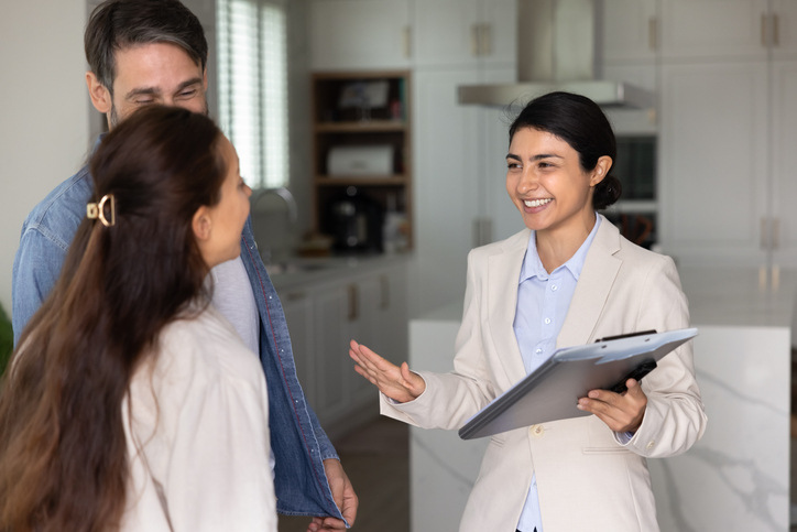 A landlord conducting regular maintenance checks to address any issues reported by tenants, helping reduce tenant turnover in Alberta.