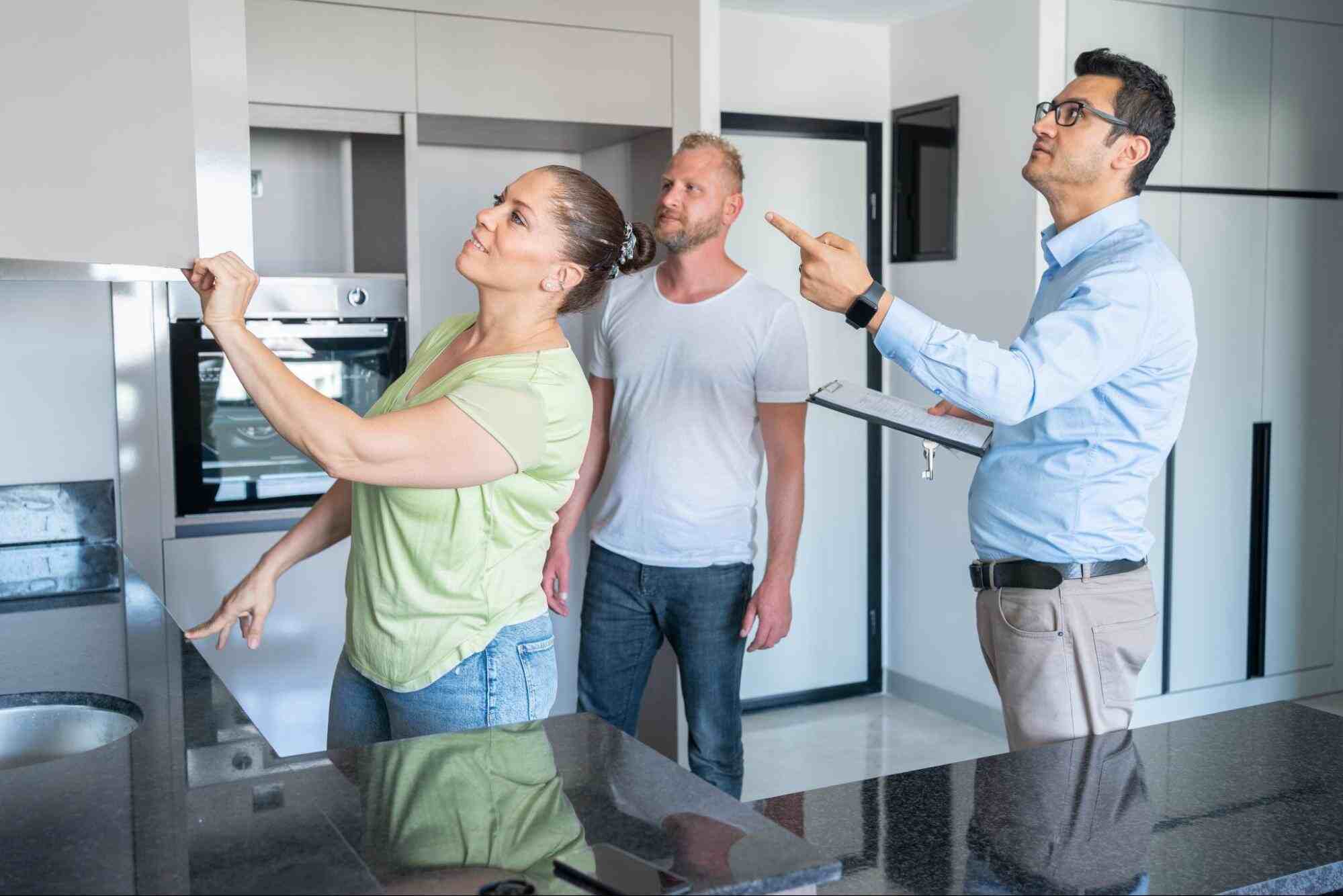 Property manager conducting a rental property inspection with homeowners, highlighting property manager vs owner roles and property owners responsibilities.